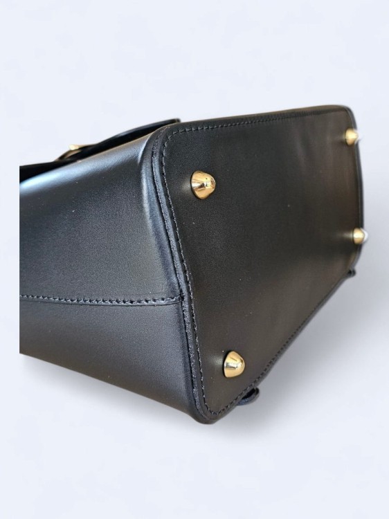 Elegancki skórzany plecak z klamrą czarny