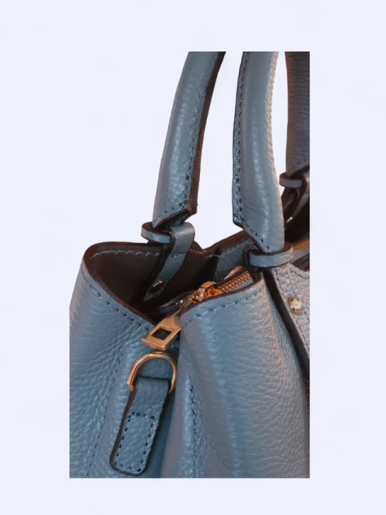 Skórzana torebka kuferek