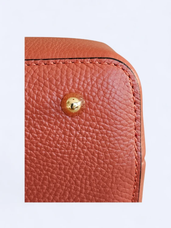 Skórzana torebka kuferek